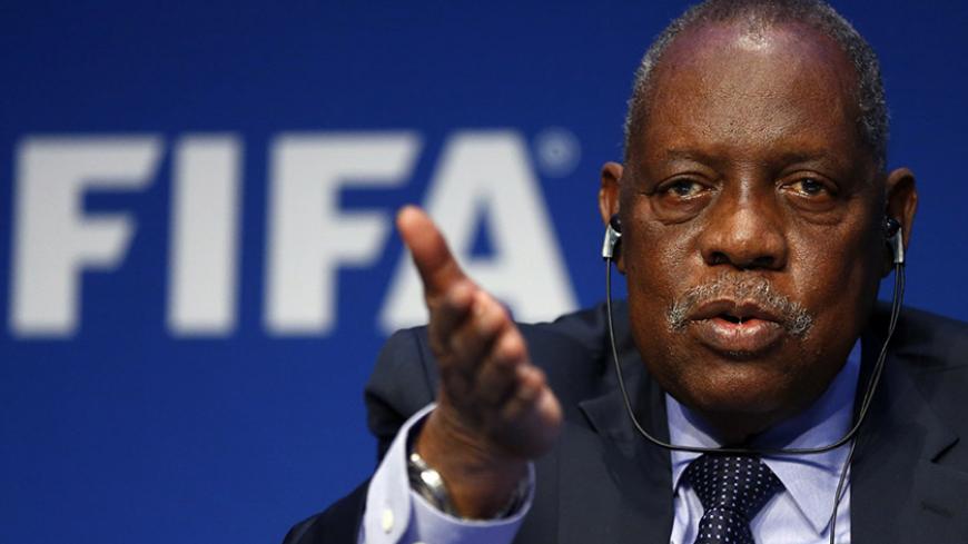 FIFA's acting president Issa Hayatou addresses a news conference after a meeting of the Executive Committee at FIFA's headquarters in Zurich, Switzerland December 3, 2015. REUTERS/Arnd Wiegmann - RTX1X0JI