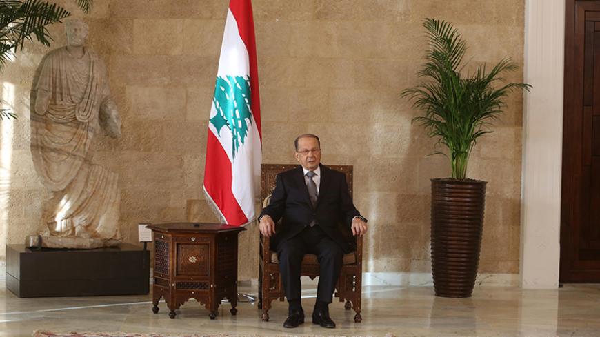 Newly elected Lebanese president Michel Aoun sits on the president's chair inside the presidential palace in Baabda, near Beirut, Lebanon October 31, 2016. REUTERS/Aziz Taher - RTX2R7JE