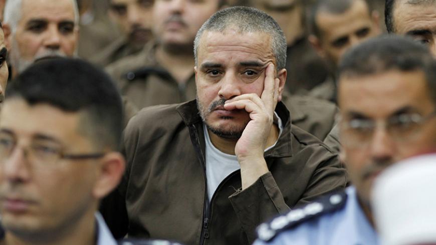 Ahmad Daqamseh, a Jordanian soldier convicted of killing seven Israeli schoolgirls on March 13, 1997, is seen at Um Alluol prison in the city of Mafraq, Jordan, July 30, 2013. Picture taken  July 30, 2013. REUTERS/Muhammad Hamed - RTX30MQ8