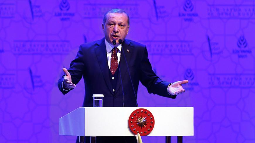 Turkish President Tayyip Erdogan makes a speech during a meeting in Istanbul, Turkey, March 19, 2017. REUTERS/Murad Sezer - RTX31PVP