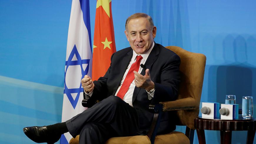 Israeli Prime Minister Benjamin Netanyahu speaks during a dialogue with Robin Li (not pictured), founder and chief executive of Chinese search engine Baidu, in Beijing, China March 21, 2017. REUTERS/Jason Lee - RTX31Y05