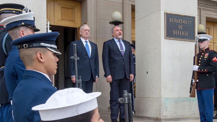 US Secretary of Defense James Mattis(L) stands with Israel's Minister of Defense Avigdor Lieberman with an Honor Guard, listening to their respective national anthems upon  arrival to the Pentagon on March 7, 2017 in Washington, DC. / AFP PHOTO / PAUL J. RICHARDS        (Photo credit should read PAUL J. RICHARDS/AFP/Getty Images)