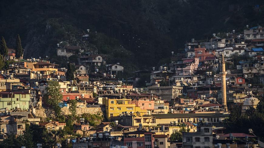 A picture taken on April 7, 2017 at sunset shows a view of Hatay (aka Antakya) in southern Turkey. / AFP PHOTO / OZAN KOSE        (Photo credit should read OZAN KOSE/AFP/Getty Images)