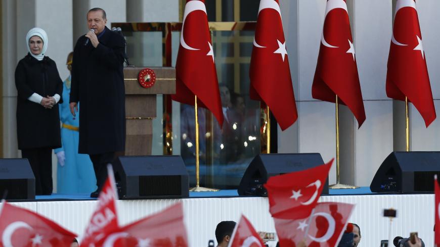 Turkish President Tayyip Erdogan addresses his supporters at the Presidential Palace in Ankara, Turkey, April 17, 2017. REUTERS/Umit Bektas - RTS12NRL