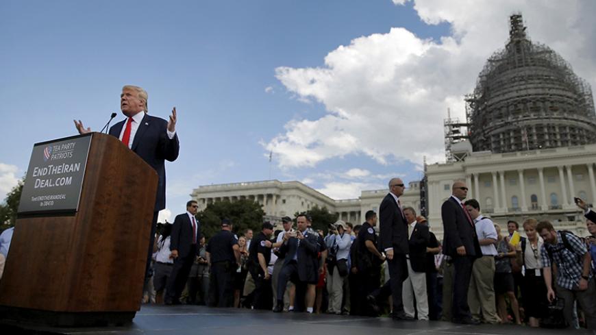 U.S. Republican presidential candidate Donald Trump addresses a Tea Party rally against the Iran nuclear deal at the U.S. Capitol in Washington September 9, 2015. REUTERS/Jonathan Ernst - RTSDML