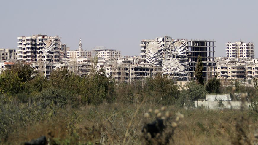 A general view shows damaged buildings in the Waer district in the central Syrian city of Homs, Syria September 19, 2016. REUTERS/Omar Sanadiki - RTSOFCN