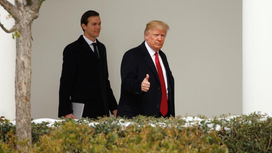 U.S. President Donald Trump gives a thumbs-up as he and White House Senior Advisor Jared Kushner depart the White House in Washington, U.S., March 15, 2017. REUTERS/Kevin Lamarque - RTX3155P