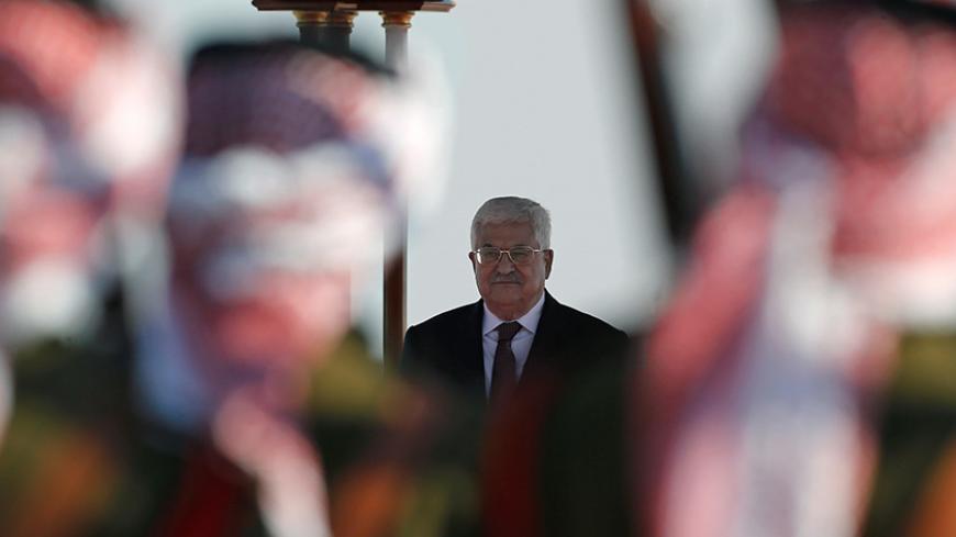 Palestinian President Mahmoud Abbas stands on podium during a reception ceremony at the Queen Alia International Airport in Amman, Jordan March 28, 2017. REUTERS/Muhammad Hamed - RTX332HR