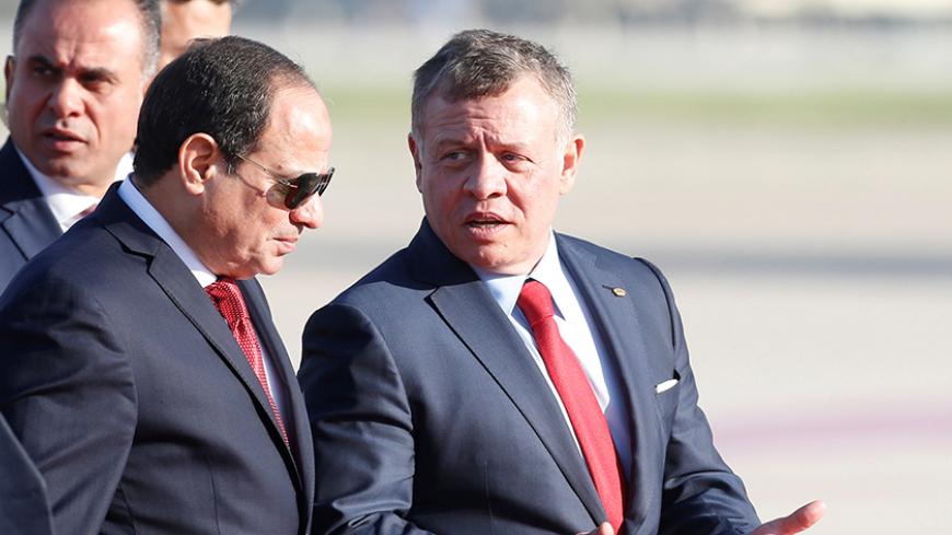 Jordan's King Abdullah II welcomes Egypt's President Abdel Fattah al-Sisi during a reception ceremony at the Queen Alia International Airport in Amman, Jordan March 28, 2017. REUTERS/Muhammad Hamed - RTX332K0