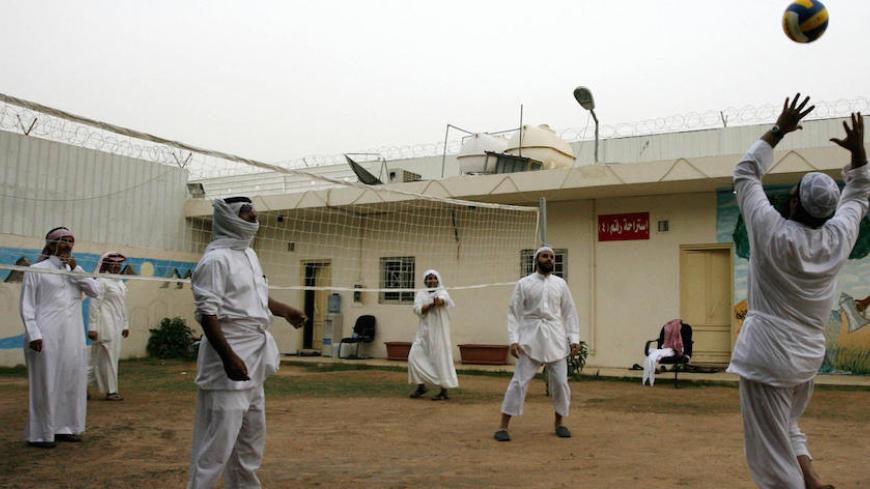 TO GO WITH AFP STORY BY PAUL HANDLEY Saudi former al-Qaeda Islamists play volleyball at a rehabilitation center for militants in Riyadh on April 15, 2009. Saudi Arabia set up the pioneering rehabilitation facility three years ago for returnees from the US prison at Guantanamo Bay in Cuba and for militants arrested inside the country. The care centre is Saudi Arabia's front line for ensuring that Al-Qaeda does not rear its head again, after a series of lethal domestic attacks between 2003 and 2006 forced Riy