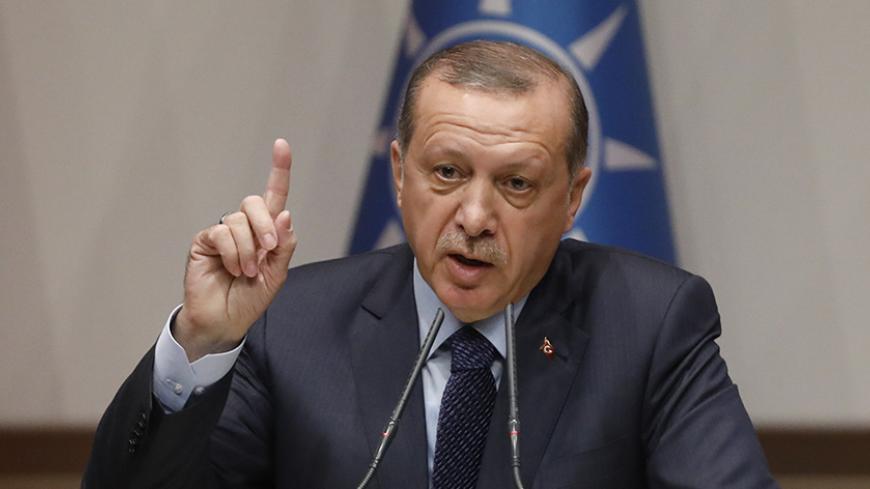 Turkish President Tayyip Erdogan makes a speech at the ruling AK Party's headquarters in Ankara, Turkey, May 2, 2017. REUTERS/Umit Bektas - RTS14S96