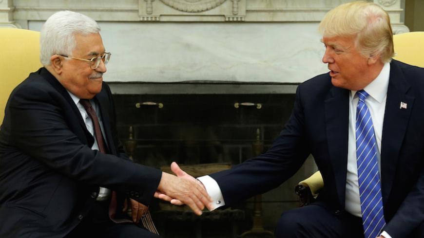 U.S. President Donald Trump welcomes Palestinian Authority President Mahmoud Abbas in the Oval Office at the White House in Washington, U.S. May 3, 2017.  REUTERS/Jonathan Ernst - RTS14ZJL
