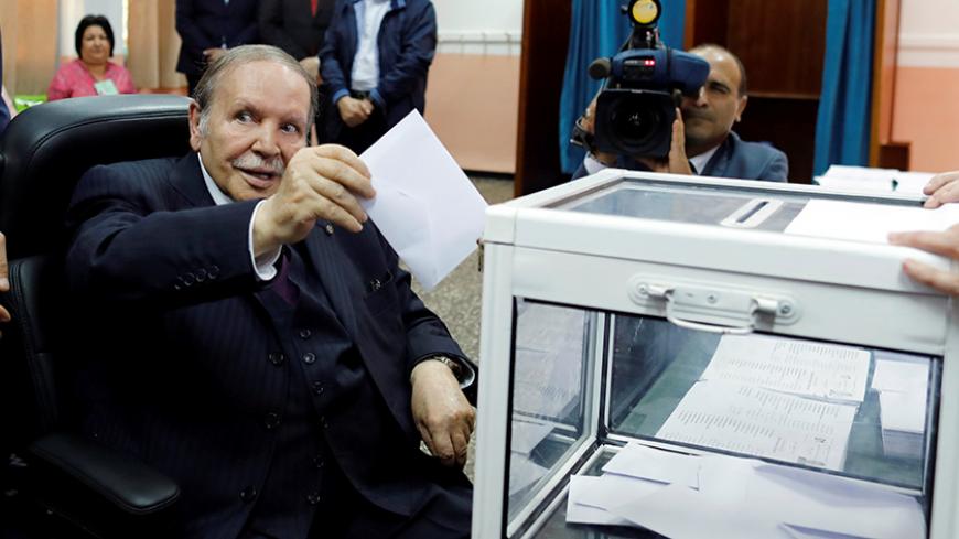 Algeria's President Abdelaziz Bouteflika casts his ballot during the parliamentary election in Algiers, Algeria May 4, 2017. REUTERS/Zohra Bensemra - RTS154OD