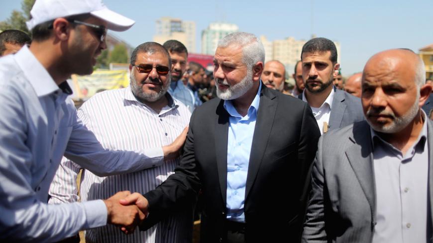 Ismail Haniyeh, newly elected head of Hamas political office, arrives to visit a sit-in in support of Palestinian prisoners on hunger strike in Israeli jails, in Gaza City May 8, 2017. REUTERS/Mohammed Salem - RTS15NZB