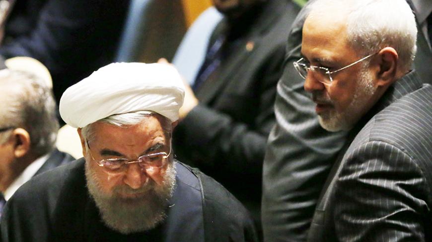 Iranian President Hassan Rouhani (L) and Iranian Foreign Minister Mohammad Javad Zarif arrive for a plenary meeting of the United Nations Sustainable Development Summit 2015 at United Nations headquarters in Manhattan, New York, September 25, 2015. More than 150 world leaders are expected to attend the U.N. Sustainable Development Summit from September 25-27 at the United Nations in New York to formally adopt an ambitious new sustainable development agenda a press statement by the U.N. stated      REUTERS/D