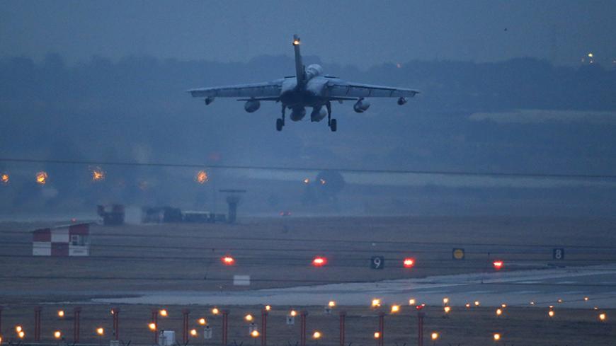 A German air force Tornado jet lands at an airbase in Incirlik, Turkey, December 10, 2015. The first the German air force Tornado reconnaissance jets will take off for Turkey's Incirlik air base on Thursday, to support the military campaign against Islamic State. REUTERS/Umit Bektas - RTX1Y3FP