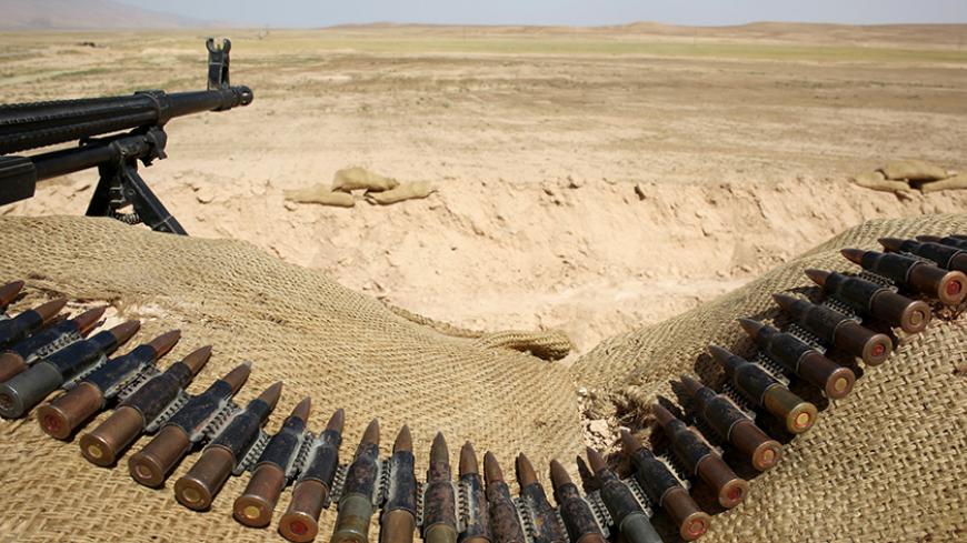 Bullets lie next to a gun at a Sinjar Resistance Units (YBS) check point, a militia affiliated with the Kurdistan Workers’ Party (PKK), in the village of Umm al-Dhiban, northern Iraq, April 30, 2016. They share little more than an enemy and struggle to communicate on the battlefield, but together two relatively obscure groups have opened up a new front against Islamic State militants in a remote corner of Iraq. The unlikely alliance between the Sinjar Resistance Units, an offshoot of a leftist Kurdish organ