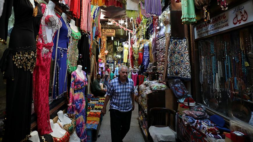 An outdoor tourist market with clothing on display in Cairo, Egypt May 17, 2017. REUTERS/Mohamed Abd El Ghany - RTX3696C