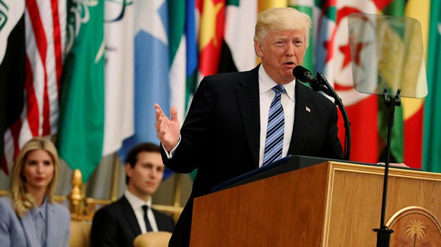 U.S. President Donald Trump, flanked by Ivanka Trump and White House senior advisor Jared Kushner, delivers remarks to the Arab Islamic American Summit in Riyadh, Saudi Arabia May 21, 2017.  REUTERS/Jonathan Ernst - RTX36VDD