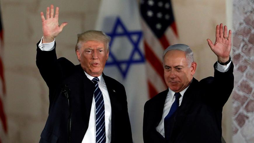 U.S. President Donald Trump and Israeli Prime Minister Benjamin Netanyahu wave after Trump's address at the Israel Museum in Jerusalem May 23, 2017. REUTERS/Ronen Zvulun - RTX378DP