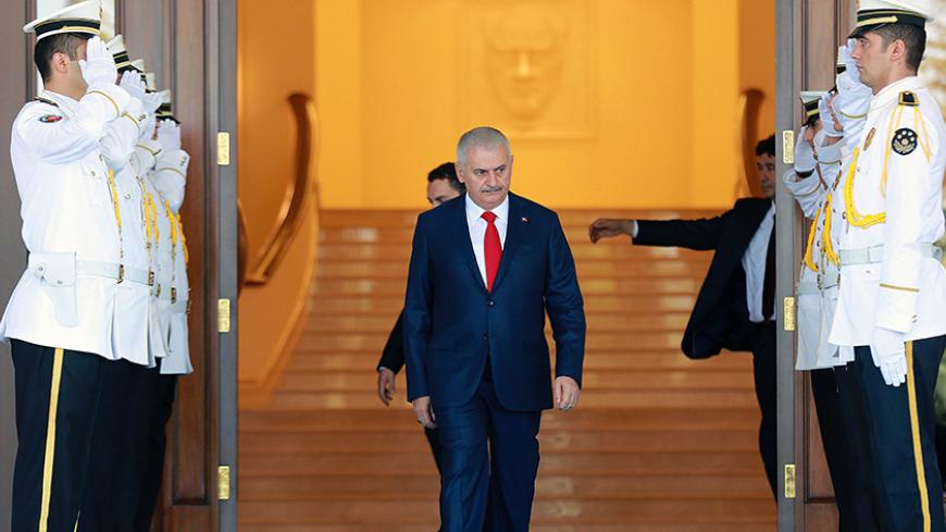 Turkish Prime Minister Binali Yildirim (C) arrives to welcome Qatar's Prime Minister Abdullah bin Nasser bin Khalifa Al Thani (Unseen) before their meeting at Cankaya Mansion in Ankara, on September 8, 2016. / AFP / ADEM ALTAN        (Photo credit should read ADEM ALTAN/AFP/Getty Images)