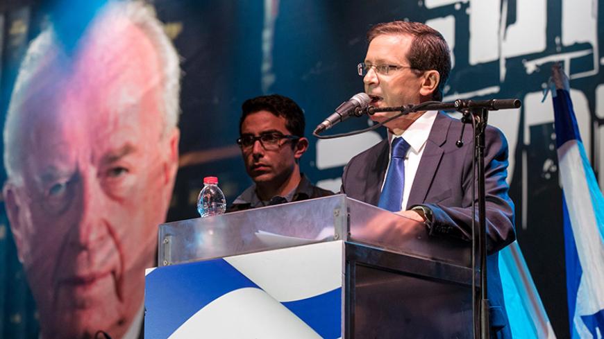 Israeli co-leader of the Zionist Union party and Labour Party's leader, Isaac Herzog, gives a speech during a rally to mark the 21th anniversary of the assassination of former Israeli prime minister Yitzhak Rabin at the Tel Aviv plaza where he was shot in the Mediterranean coastal city of Tel Aviv on November 5, 2016.
Thousands of people attended a memorial rally for Rabin, despite earlier fears it would be cancelled, an AFP journalist at the event said.

 / AFP / JACK GUEZ        (Photo credit should read 