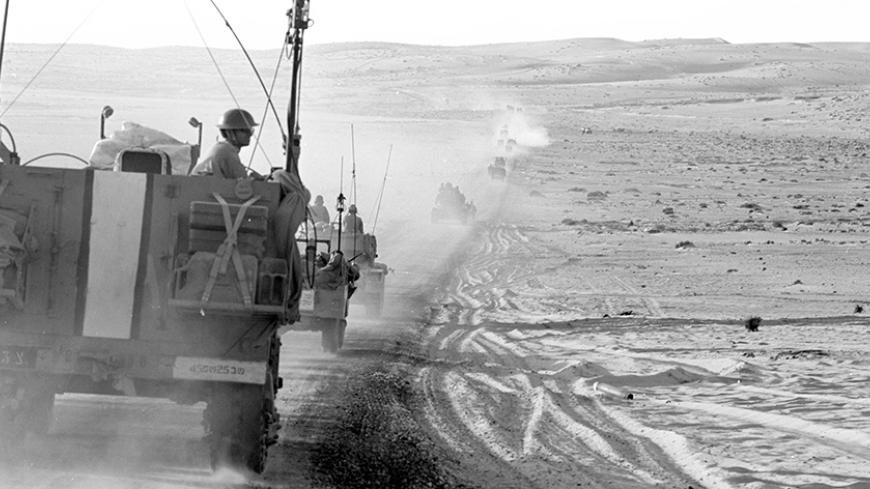 A convoy of Israeli armoured military vehicles rolls through the Sinai peninsula during the 1967 Middle East War, widely known as the Six Day War, in this picture released on June 4, 2007 by Israel's Defence Ministry. Forty years ago this week, Israel swept to victory in six days in a war with Egypt, Syria and Jordan, capturing the Sinai peninsula, Golan Heights, Gaza Strip and West Bank, including Arab East Jerusalem. REUTERS/Israeli Defence Ministry/Handout BLACK AND WHITE ONLY.  EDITORIAL USE ONLY. NOT F