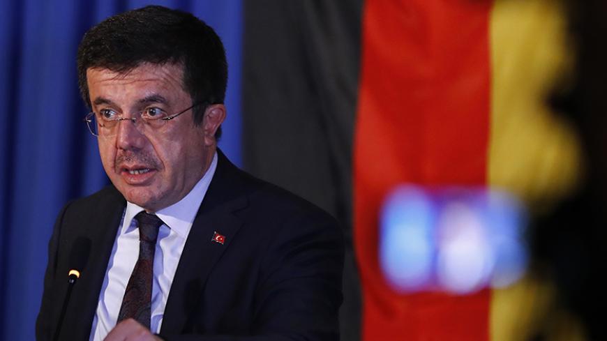 Turkey's Economy Minister Nihat Zeybekci makes a speech in Cologne, Germany, March 5, 2017. REUTERS/Wolfgang Rattay - RTS11K0S