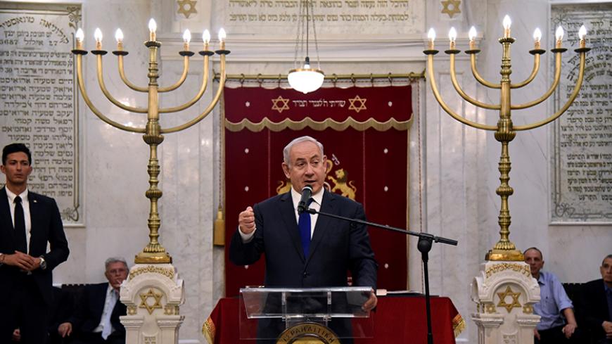 Israeli Prime Minister Benjamin Netanyahu speaks at the Monastirioton synagogue in Thessaloniki, Greece June 15, 2017. REUTERS/Alexandros Avramidis - RTS179BA