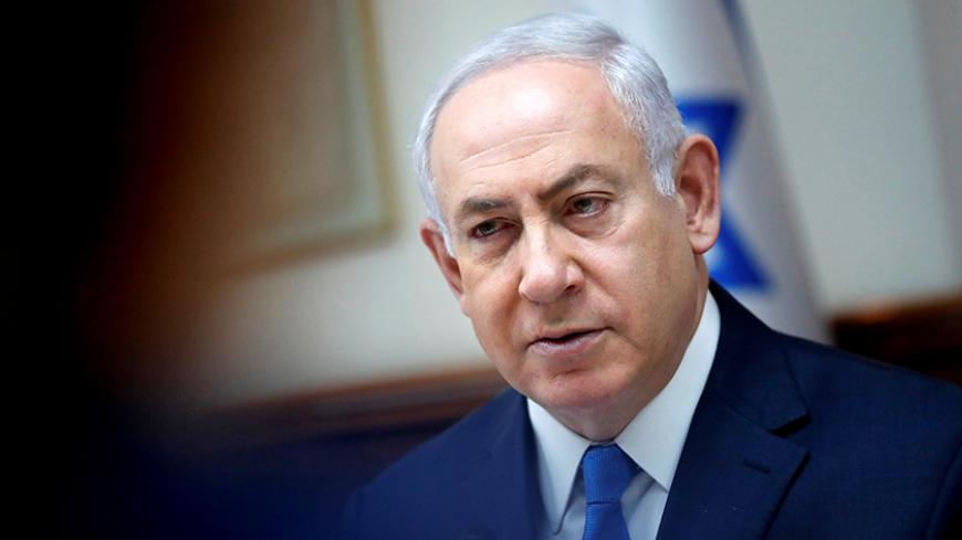 Israeli Prime Minister Benjamin Netanyahu chairs the weekly cabinet meeting in Jerusalem July 3, 2017. REUTERS/Thomas Coex/Pool - RTS19JBA