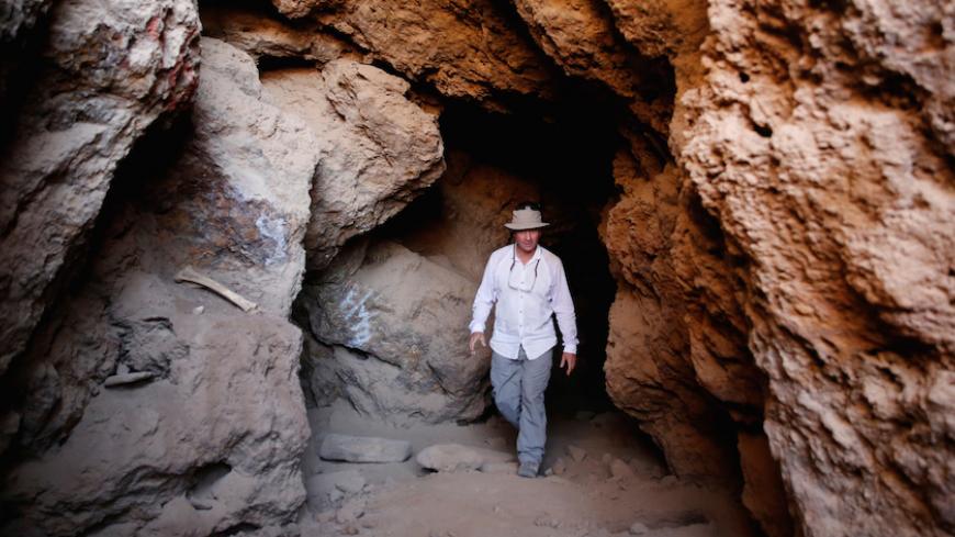 Geologist Leonard Karr walks out from an old mine in the Eastern Desert near the southern province of Luxor, Egypt May 20, 2016. REUTERS/Amr Abdallah Dalsh - RTSGK11