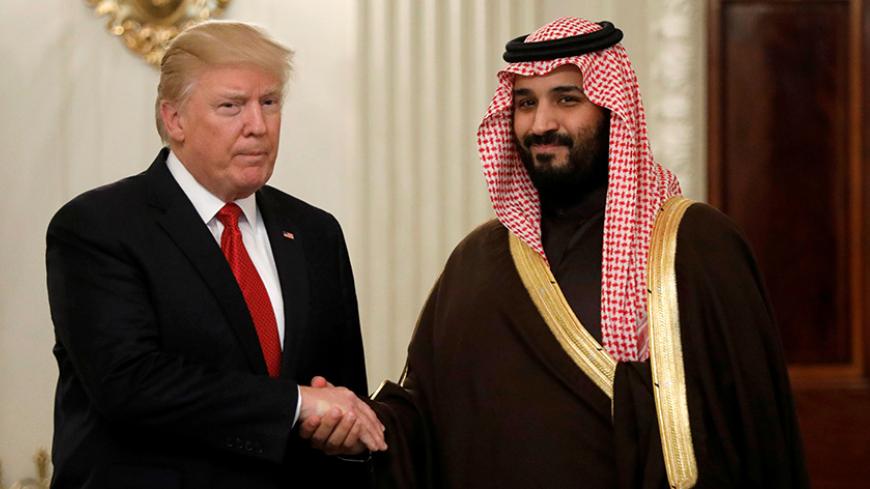 U.S. President Donald Trump and Saudi Deputy Crown Prince and Minister of Defense Mohammed bin Salman meet at the White House  in Washington, U.S., March 14, 2017. REUTERS/Kevin Lamarque - RTX30ZV3