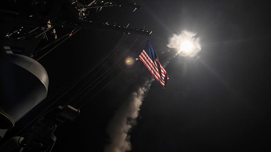 U.S. Navy guided-missile destroyer USS Porter (DDG 78) conducts strike operations while in the Mediterranean Sea which U.S. Defense Department said was a part of cruise missile strike against Syria  on April 7, 2017.  Ford Williams/Courtesy U.S. Navy/Handout via REUTERS   ATTENTION EDITORS - THIS IMAGE WAS PROVIDED BY A THIRD PARTY. EDITORIAL USE ONLY.  TPX IMAGES OF THE DAY - RTX34HHA