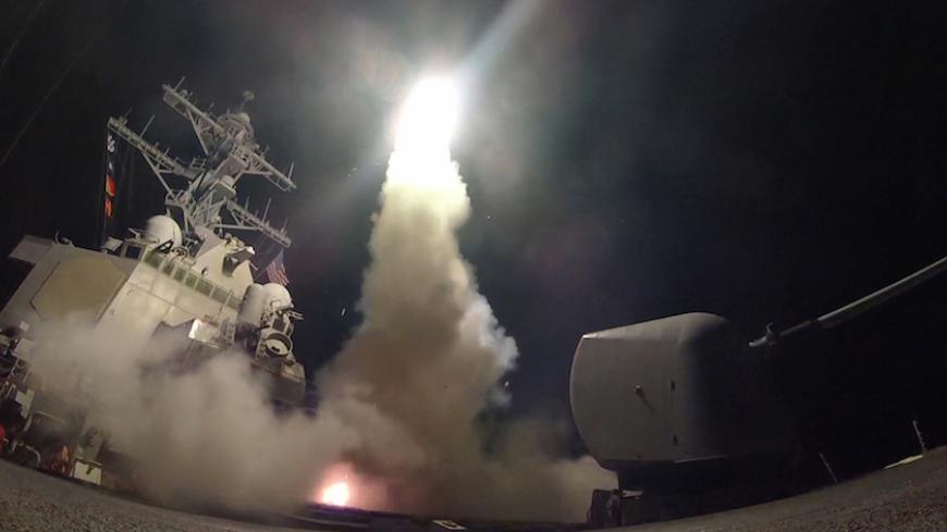 U.S. Navy guided-missile destroyer USS Porter (DDG 78) conducts strike operations while in the Mediterranean Sea which U.S. Defense Department said was a part of cruise missile strike against Syria  on April 7, 2017.  Ford Williams/Courtesy U.S. Navy/Handout via REUTERS   ATTENTION EDITORS - THIS IMAGE WAS PROVIDED BY A THIRD PARTY. EDITORIAL USE ONLY. - RTX34HHI