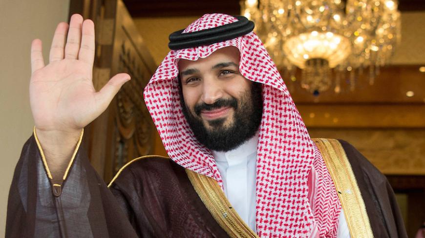Saudi Deputy Crown Prince Mohammed bin Salman waves as he meets with Philippine President Rodrigo Duterte in Riyadh, Saudi Arabia, April 11, 2017. Bandar Algaloud/Courtesy of Saudi Royal Court/Handout via REUTERS ATTENTION EDITORS - THIS PICTURE WAS PROVIDED BY A THIRD PARTY. FOR EDITORIAL USE ONLY. - RTX354MZ