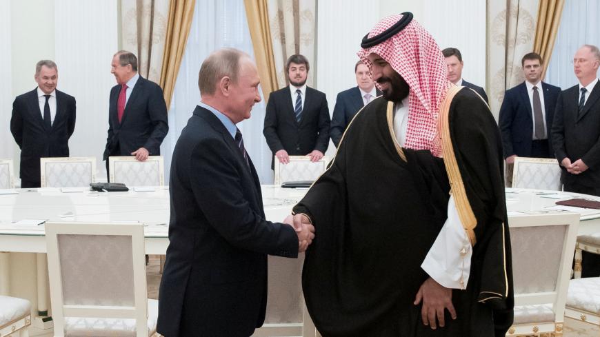 Russian President Vladimir Putin shakes hands with Saudi Deputy Crown Prince and Defence Minister Mohammed bin Salman during a meeting at the Kremlin in Moscow, Russia, May 30, 2017. REUTERS/Pavel Golovkin/Pool - RTX388UH
