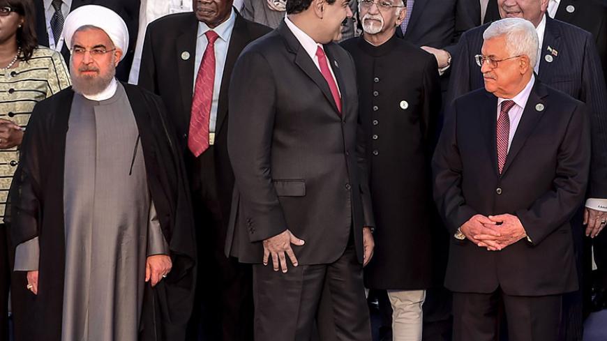 (down L-R)Iranian President Hassan Rouhani, Venezuelan president Nicolas Maduro, Palestinian President Mahmoud Abbas, Bolivian president Evo Morales and North Korea's nominal head of state Kim Yong Nam pose during the photo family after the opening ceremony of the Non-Aligned Movement summit in Porlamar, Margarita Island, Venezuela, on September 17, 2016.
With the left increasingly isolated by a crushing political and economic crisis, Venezuela is seeking the support of old friends at the Non-Aligned Moveme