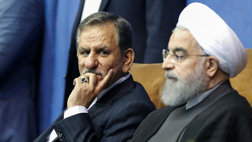 Iranian President and presidential candidate Hassan Rouhani (R), along with current vice-president and presidential candidate Eshaq Jahangiri, attend a campaign rally for the upcoming presidential elections in the capital Tehran on May 13, 2017. / AFP PHOTO / ATTA KENARE        (Photo credit should read ATTA KENARE/AFP/Getty Images)