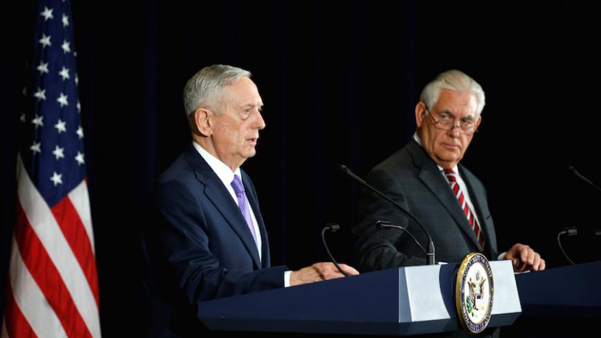 U.S. Secretary of State Rex Tillerson (R) and U.S. Secretary of Defense James Mattis hold a press conference following talks with Chinese diplomatic and defense chiefs at the State Department in Washington, U.S. June 21, 2017. REUTERS/Kevin Lamarque - RTS183M9