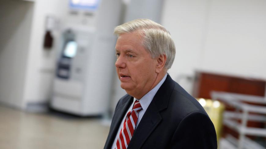 Senator Lindsey Graham (R-SC) arrives for a classified briefing on the airstrikes launched against the Syrian military, at the U.S. Capitol in Washington, U.S., April 7, 2017. REUTERS/Aaron P. Bernstein - RTX34MT2