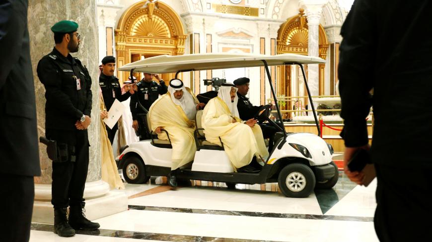 Saudi Arabia's King Salman bin Abdulaziz Al Saud (front seat) arrives to greet U.S. President Donald Trump for his address to the Arab Islamic American Summit in Riyadh, Saudi Arabia May 21, 2017.  REUTERS/Jonathan Ernst - RTX36VOB