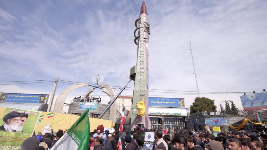 FILE PHOTO: Iranian-made Emad missile is displayed during a ceremony marking the 37th anniversary of the Islamic Revolution, in Tehran February 11, 2016. REUTERS/Raheb Homavandi/File Photo - RTX37KIM