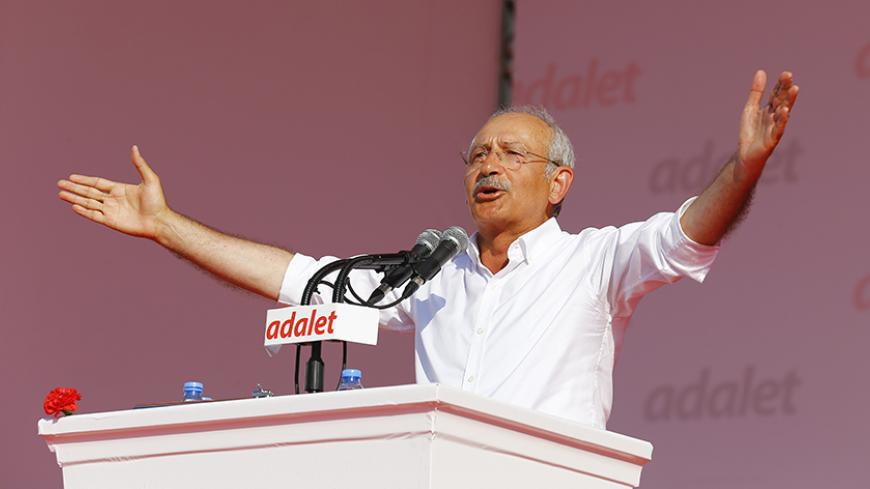 Kemal Kilicdaroglu, leader of main opposition Republican People's Party (CHP), speaks during a rally to mark the end of his 25-day long protest, dubbed "Justice March", against the detention of the party's lawmaker Enis Berberoglu, in Istanbul, Turkey July 9, 2017. REUTERS/Umit Bektas - RTX3AQZT