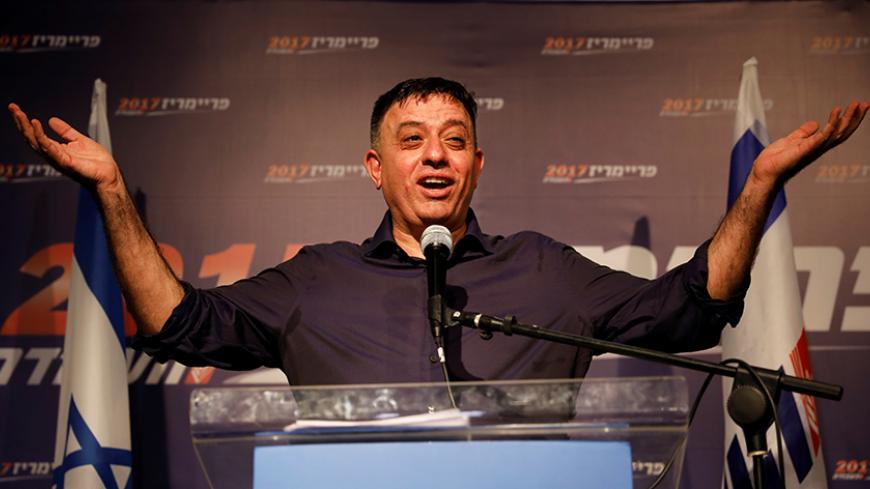 Avi Gabbai, the new leader of Israel's centre-left Labour party, gestures as he delivers his victory speech after winning the Labour party primary runoff, at an event in Tel Aviv, Israel July 10, 2017. REUTERS/Amir Cohen     TPX IMAGES OF THE DAY - RTX3AWT4