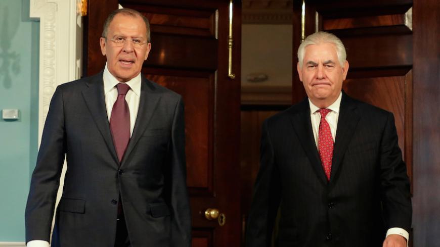 U.S. Secretary of State Rex Tillerson (R) walks with Russian Foreign Minister Sergey Lavrov before their meeting at the State Department in Washington, U.S., May 10, 2017. REUTERS/Yuri Gripas - RTS15ZZ1