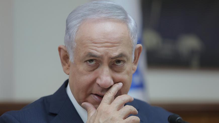 Israeli Prime Minister Benjamin Netanyahu speaks during a cabinet meeting in Jerusalem, August 13, 2017. REUTERS/Dan Balilty/Pool - RTS1BLB2