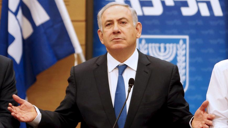 Israel's Prime Minister Benjamin Netanyahu (C) attends the Likud party meeting in the Israeli parliament in Jerusalem, in this March 28, 2016 file picture. REUTERS/Nir Elias/Files - RTX29L3P