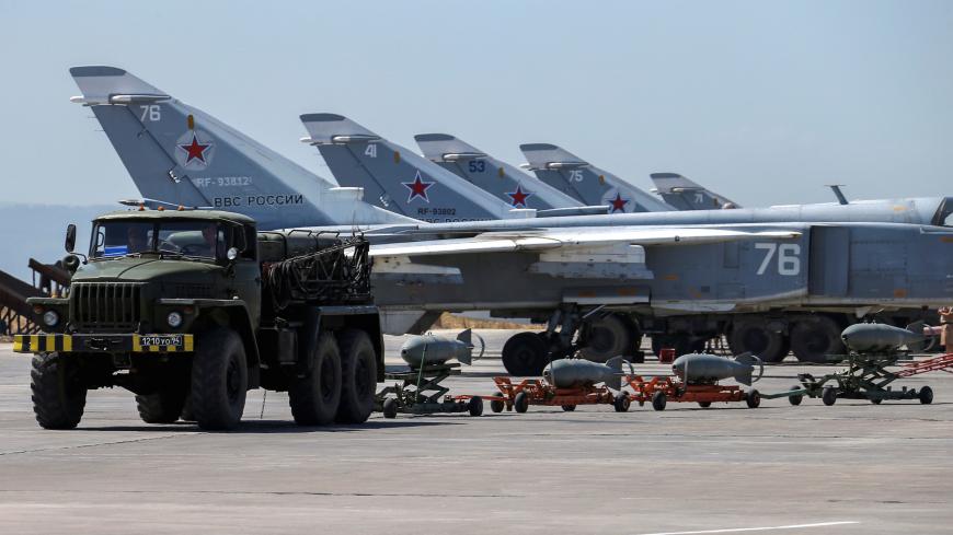 Russian military jets are seen at Hmeymim air base in Syria, June 18, 2016. Picture taken June 18, 2016. REUTERS/Vadim Savitsky/Russian Defense Ministry via Reuters ATTENTION EDITORS - THIS IMAGE WAS PROVIDED BY A THIRD PARTY. EDITORIAL USE ONLY. - RTX2H2BC
