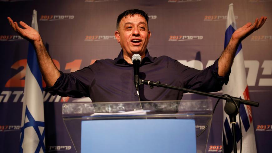 Avi Gabbai, the new leader of Israel's centre-left Labour party, gestures as he delivers his victory speech after winning the Labour party primary runoff, at an event in Tel Aviv, Israel July 10, 2017. REUTERS/Amir Cohen     TPX IMAGES OF THE DAY - RTX3AWT5