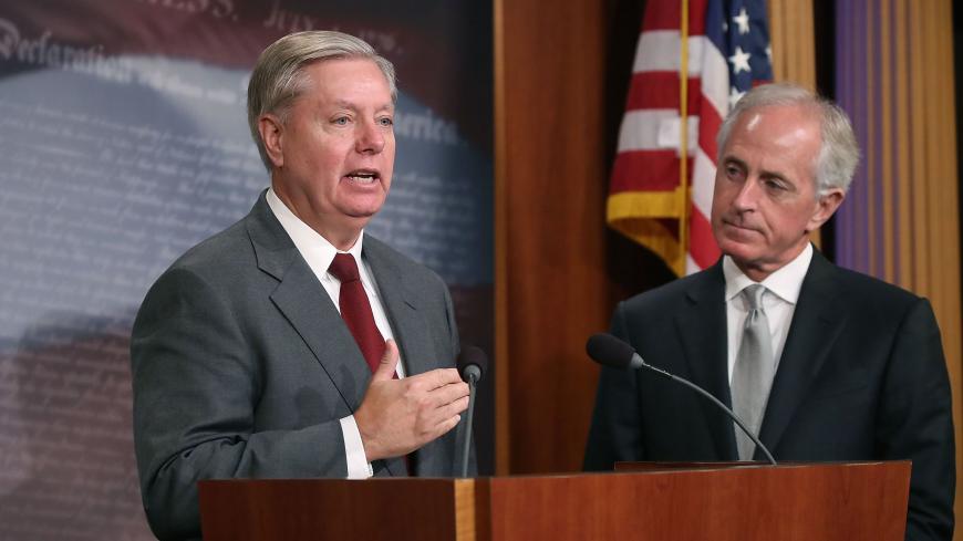WASHINGTON, DC - AUGUST 03:  Sen. Lindsey Graham (R-SC) speaks about the Taylor Force Act while flanked by Sen. Bob Corker (R-TN) during a news conference August 3, 2017 on Capitol Hill in Washington, DC. The legislation would stop economic aid to the Palestinian Authority until it halted payments to people who commit terrorist acts or payments to their families.  (Photo by Mark Wilson/Getty Images)